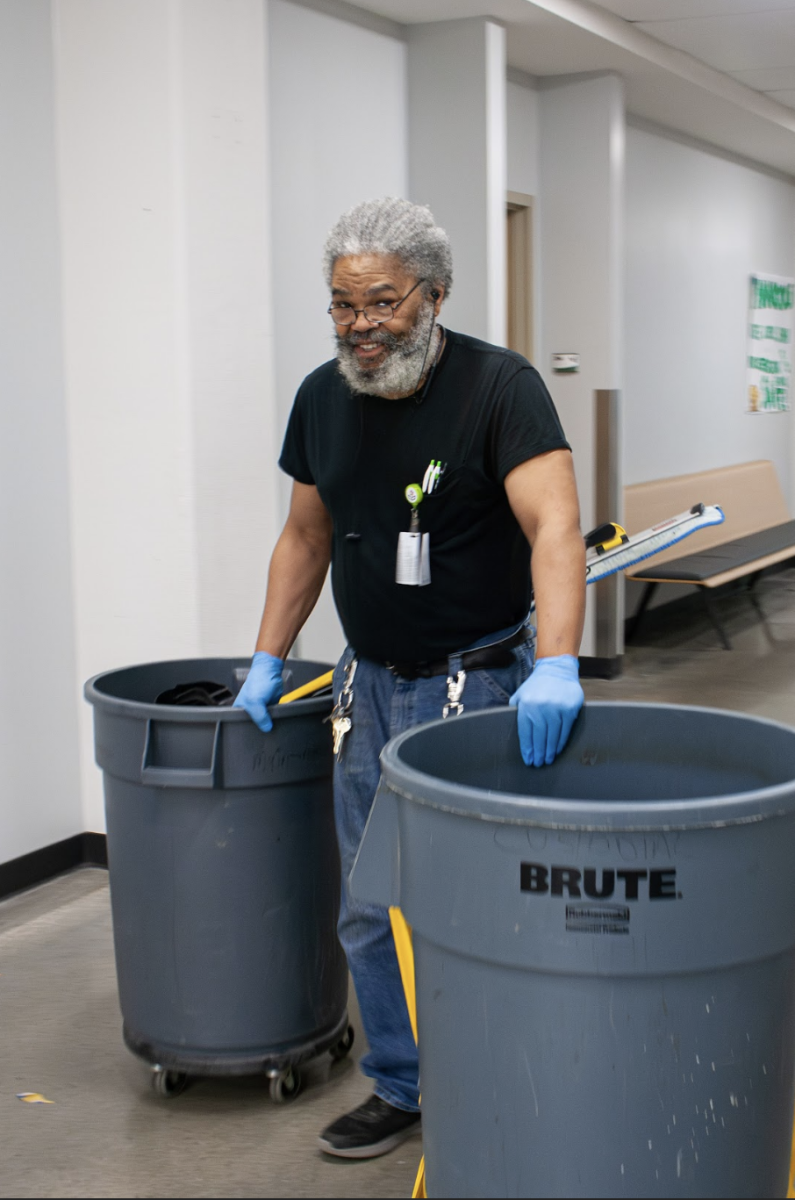 Head night custodian Dale Cowhart works during his shifts.